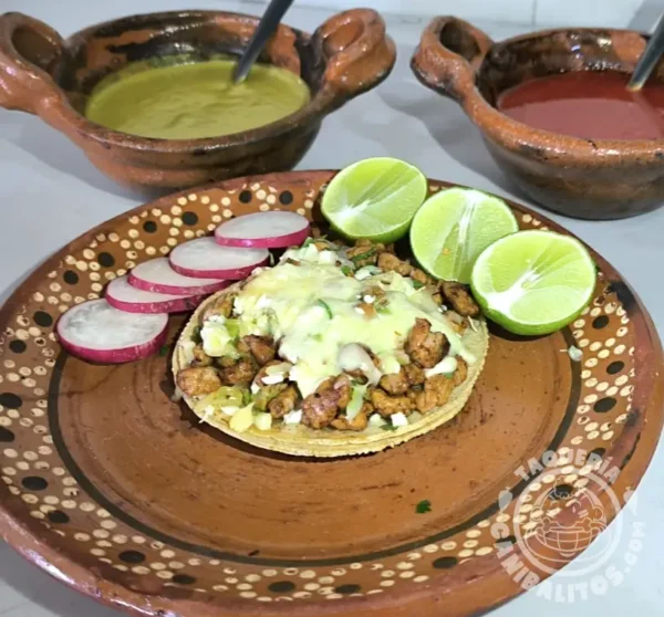 Taco de chuleta c/tortilla/maíz y queso